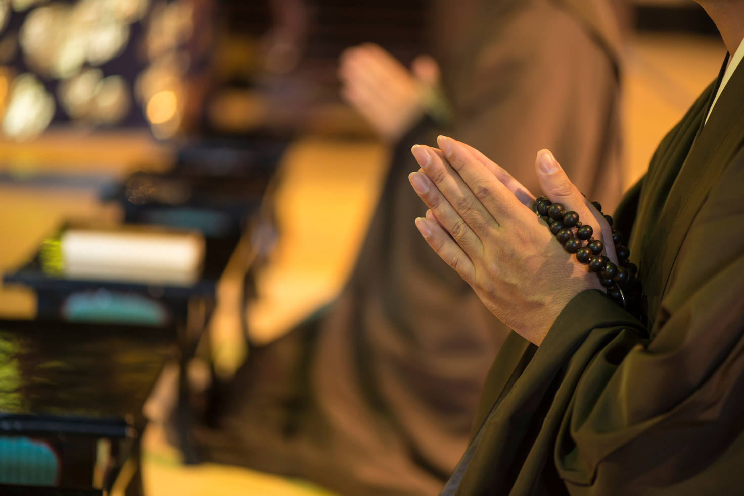 Monk during prayer in Japan